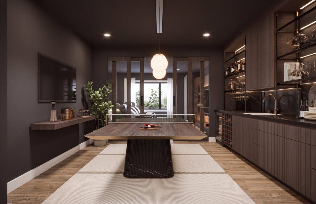 Game room with wet bar in The Hawthorne by Mirikeen Homes
