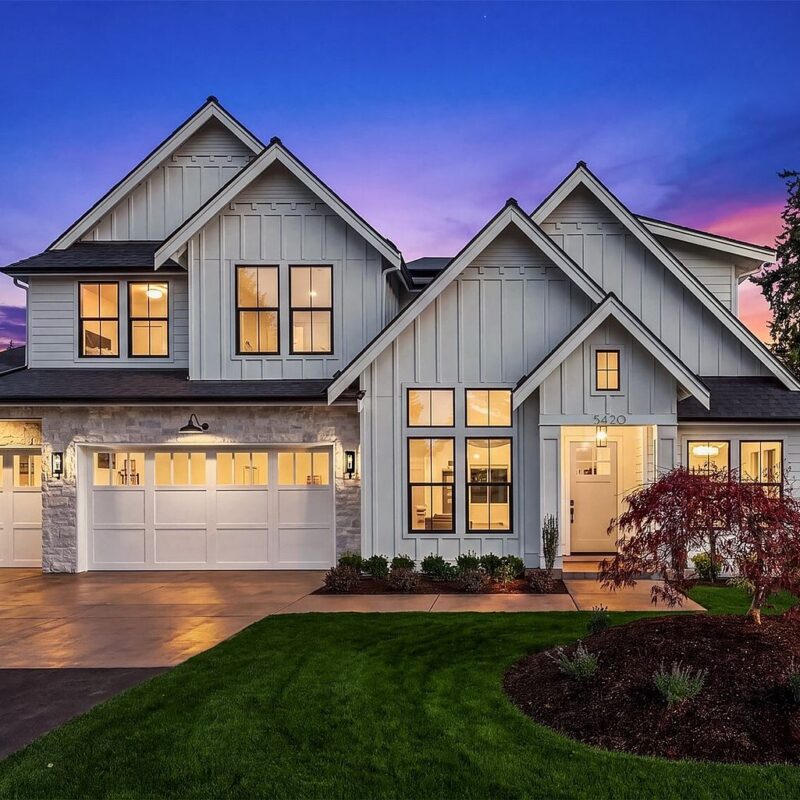 The Newport by Mirikeen Homes, front exterior at dusk