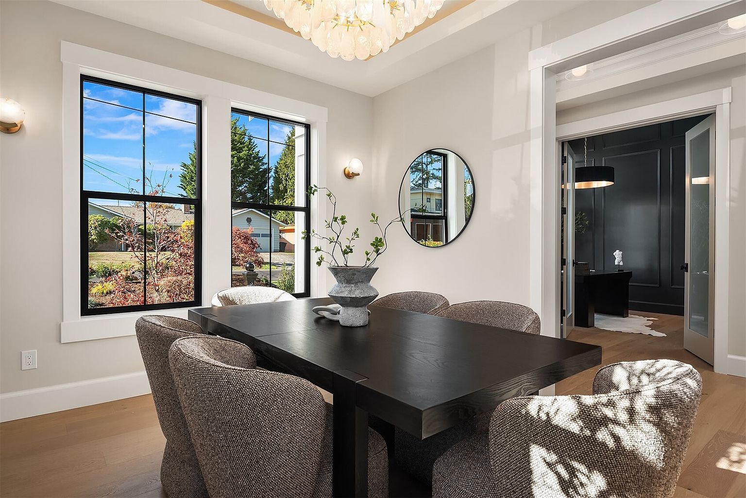 The Newport by Mirikeen Homes, dining, the den and the powder room